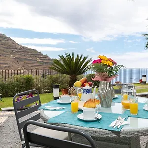 https://zezas-garden.madeira-islandshotels.com